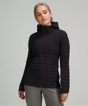 Model showcasing the black Pack It Down jacket
