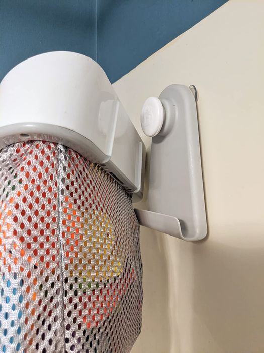 a side view of the suction holder attached to a surface