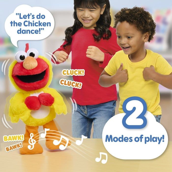 A child plays with a dancing Elmo, excitedly shouting, 'Let’s do the Chicken dance!' The toy features two interactive modes.