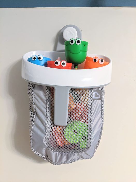 the mesh basket mounted on a bathroom wall