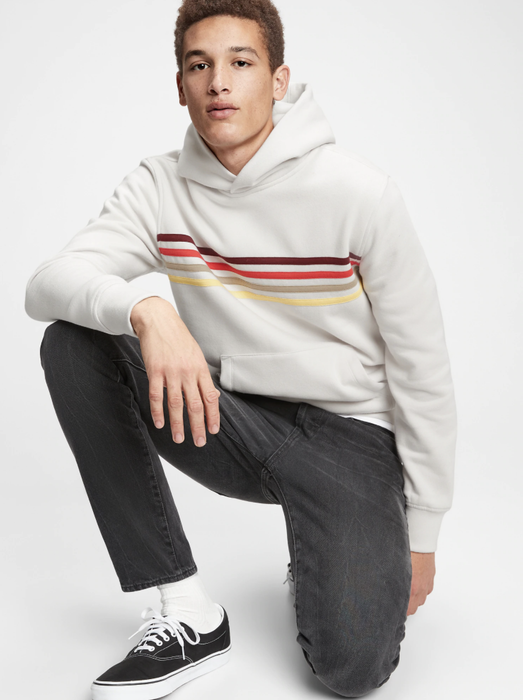 Model showcasing a sweatshirt in a soft powder gray shade