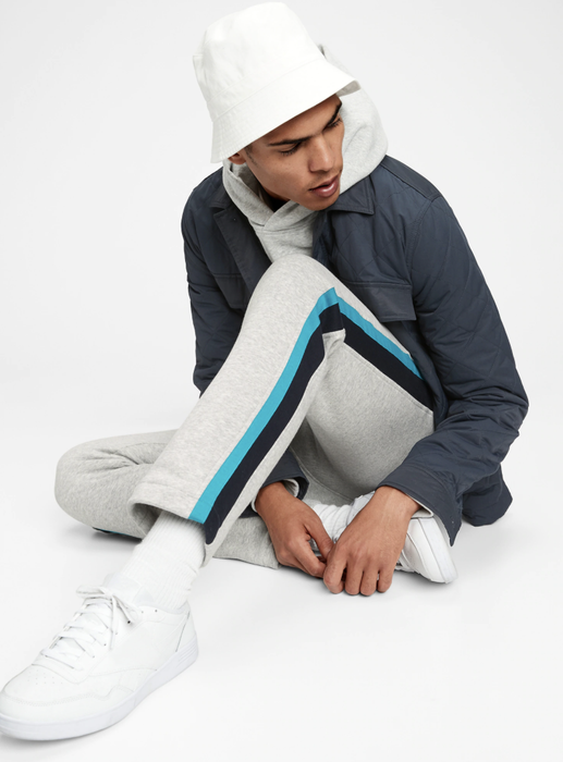 Model wearing sweatpants in a cozy gray heather shade