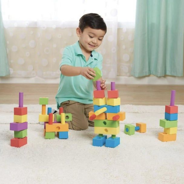 A child joyfully playing with colorful building blocks on a soft carpet, smiling and immersing themselves in imaginative play