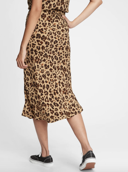Model showcasing a leopard print midi skirt