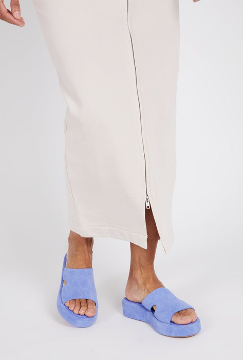 a model showcasing the stylish periwinkle slides