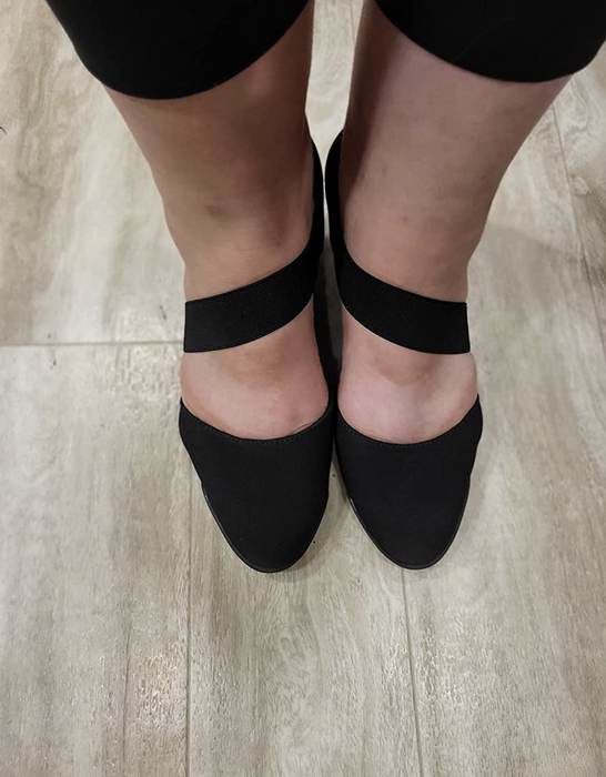 A top view of the reviewer's wedge heels, offering a closer look at the design.