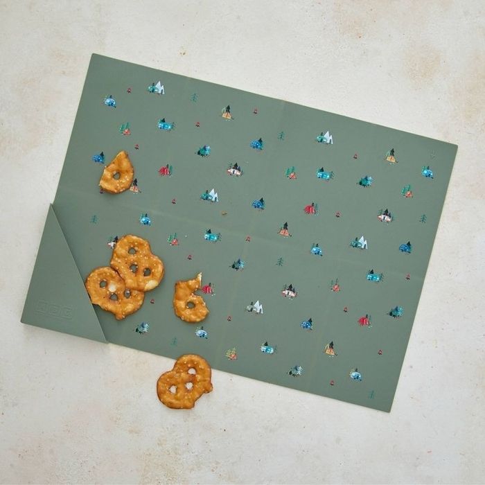 A placemat with pretzels scattered on it