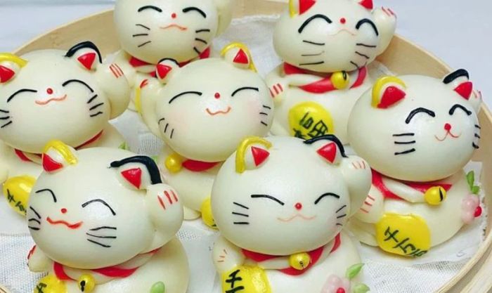 Các loại bánh hình mèo tài lộc dùng để cúng Thần Tài