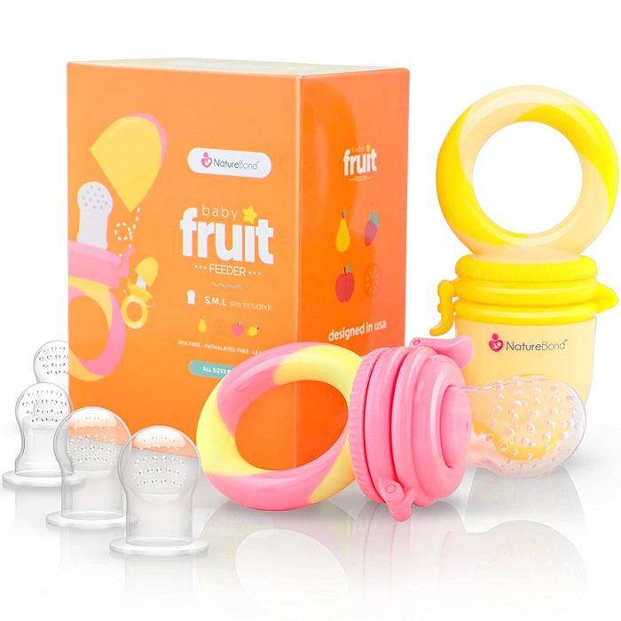 A set of food feeder pacifiers in peach pink and lemonade yellow, including two feeders and six silicone teats
