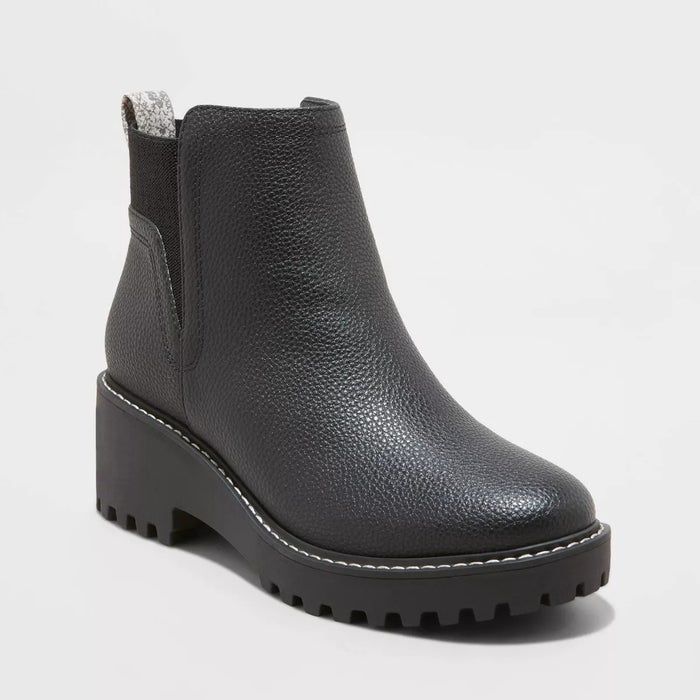 black faux leather boots with chunky soles