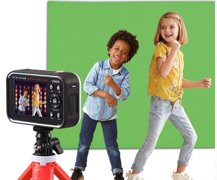 The kid’s digital video camera, featuring a sleek black design and a red tripod for steady filming.
