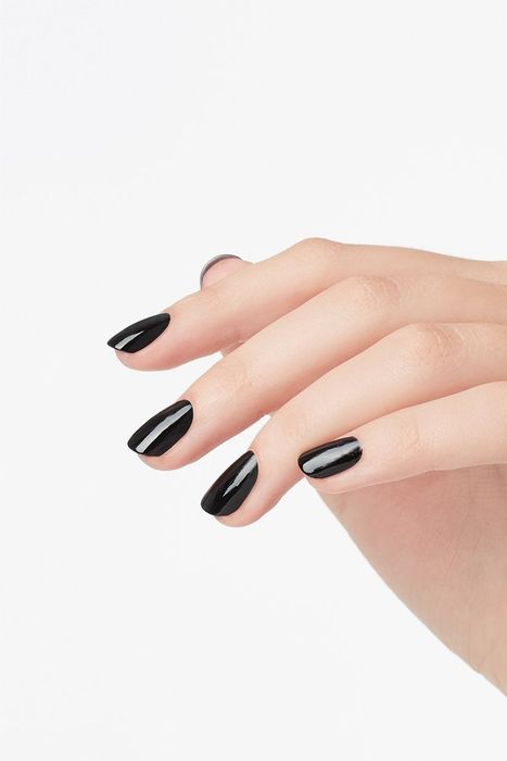 Model displaying OPI black nail polish on fingers