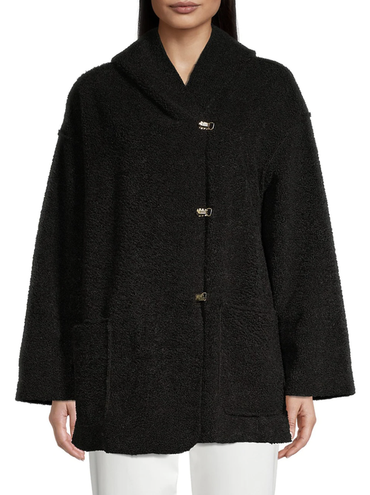 Model showcasing a hooded teddy coat
