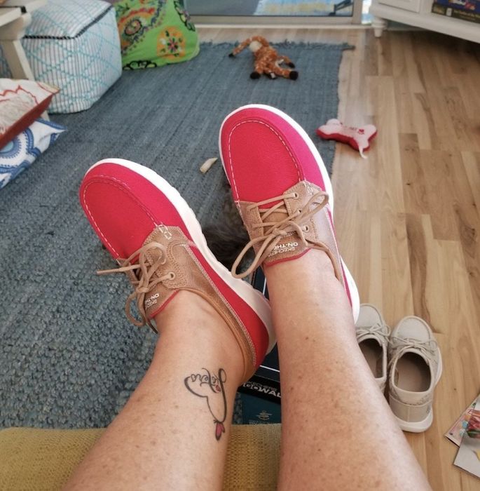 Boat shoes in a striking red and tan color combination