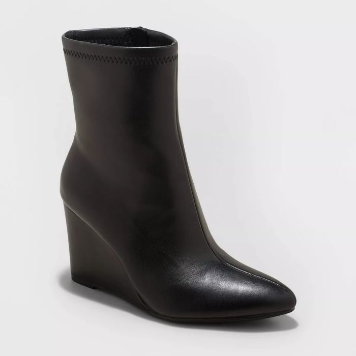 wedge black boots with a pointed toe