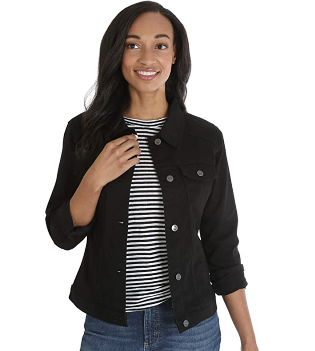 Model wearing a black denim jacket
