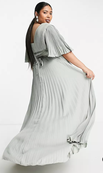 model displaying the back view of the dress