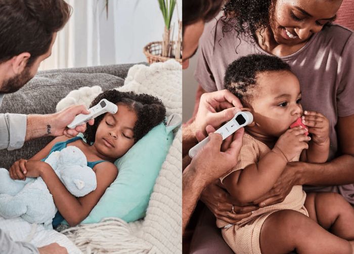Children having their temperature measured