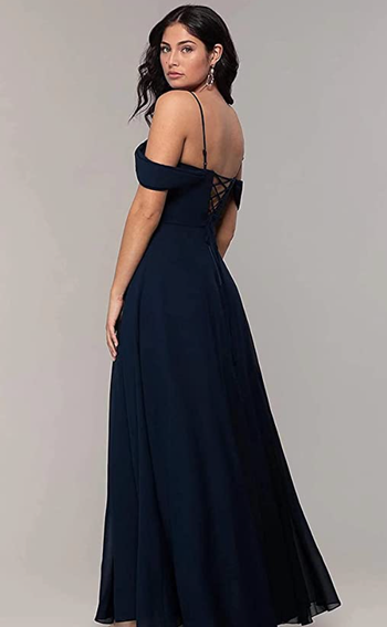 model displaying the criss-cross back design of the dress