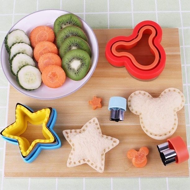 Sandwich cutters showcased alongside fruit and sandwiches
