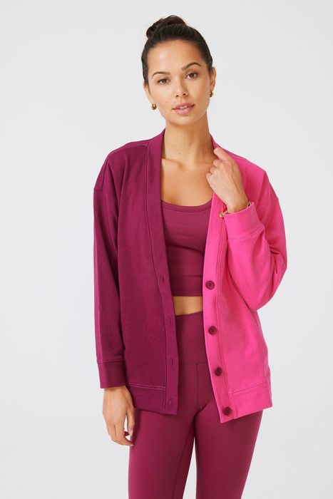 The model is wearing the two-tone sweatshirt.
