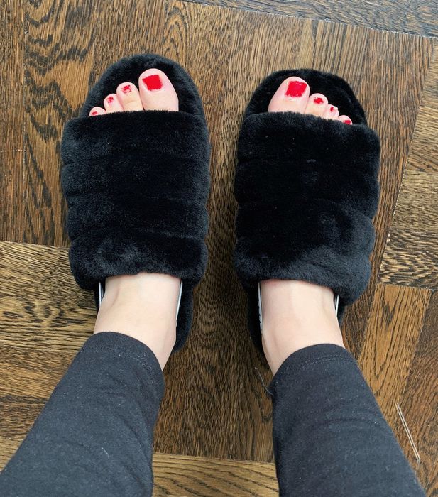 Mytour editor Maitland Quitmeyer rocking the fuzzy slippers, showcasing the open-toe design
