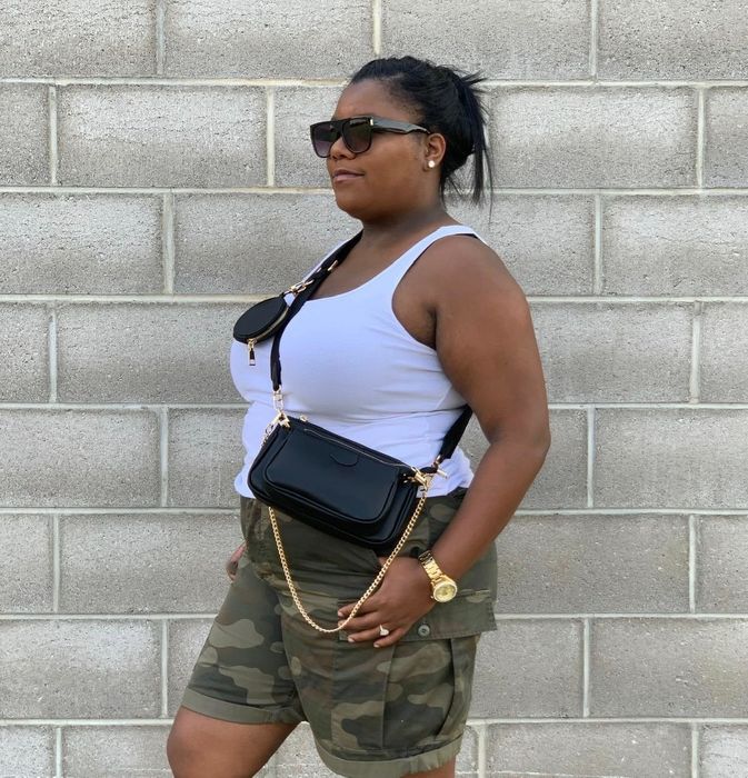 The reviewer is wearing the crossbody bag slung across their chest.