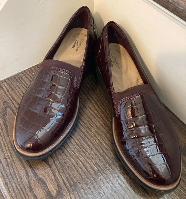 A reviewer shares a photo of the burgundy loafers