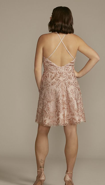 model displaying the back view of the dress