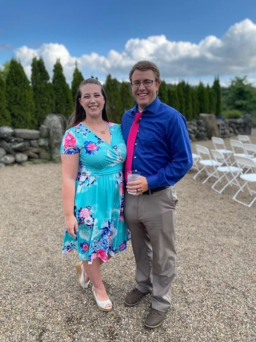 reviewer wearing the dress posing alongside another person