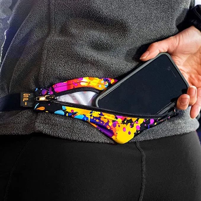 A person is shown placing their phone into a SPIbelt
