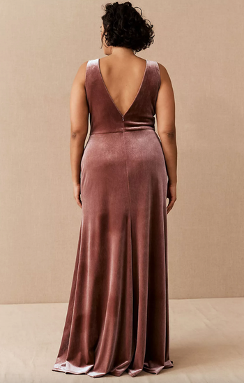 model displaying the back view of the dress