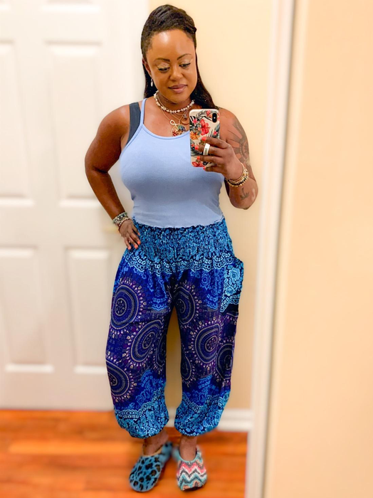 A reviewer is seen wearing the blue pants.