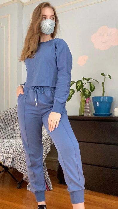 another reviewer showcasing a matching blue sweat set