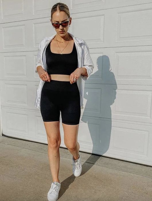a reviewer wearing the black set