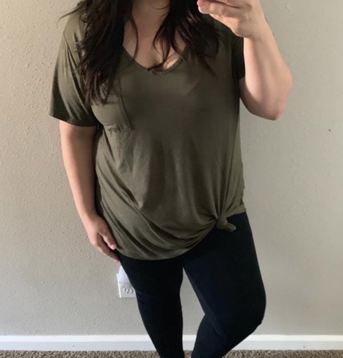 reviewer photo of model wearing the olive green t-shirt