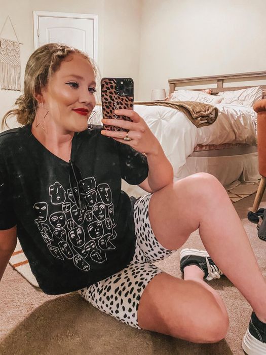 another reviewer styled in the black and white printed tee