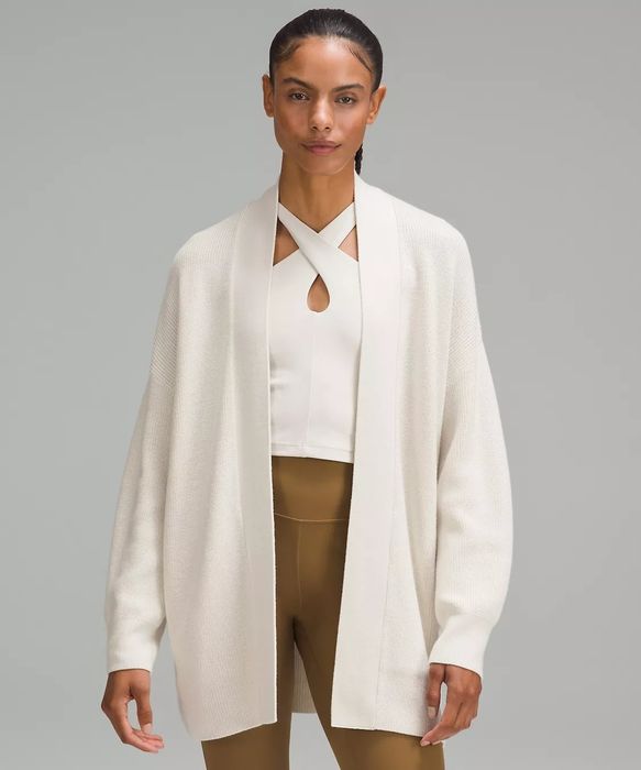 cream-colored cardigan worn by model