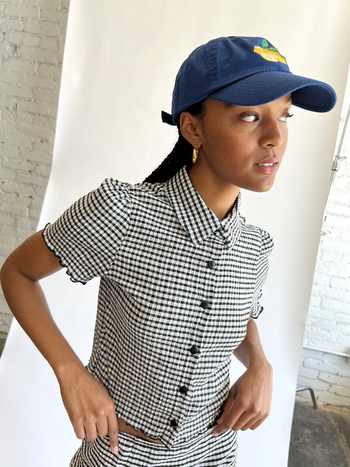 a model wearing the black and white version