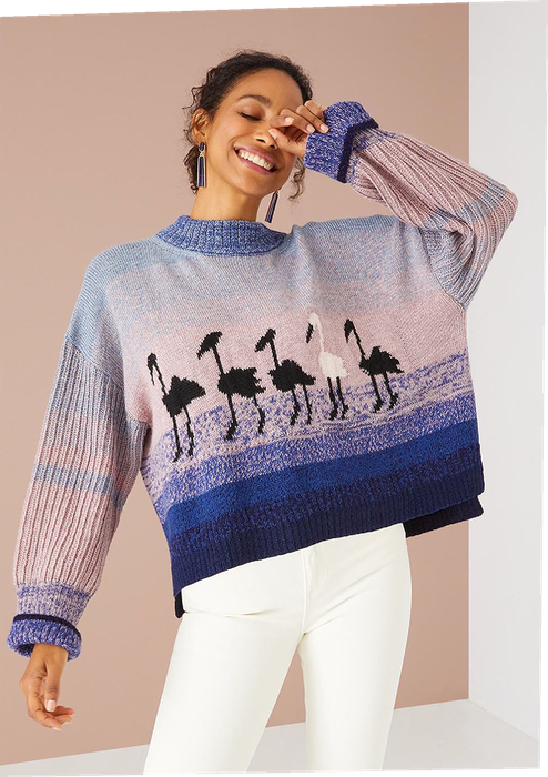 A model wearing the flamingo sweater.