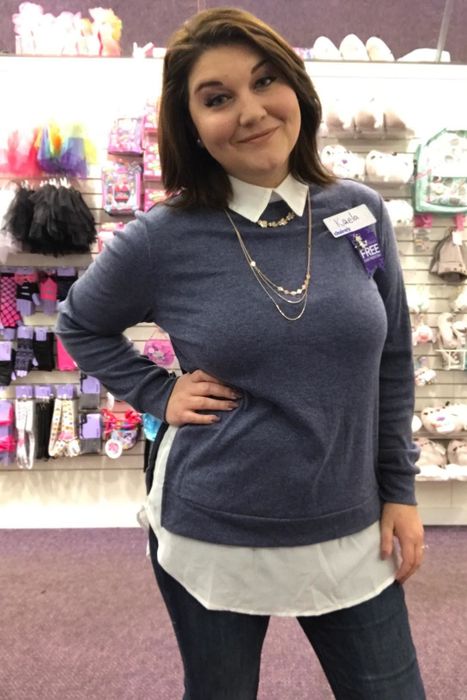 Another reviewer is styled in the same sweater, this time in a blue hue.