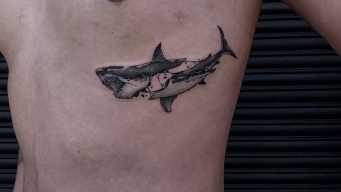 A reviewer wearing the dark green sweater dress at a winery