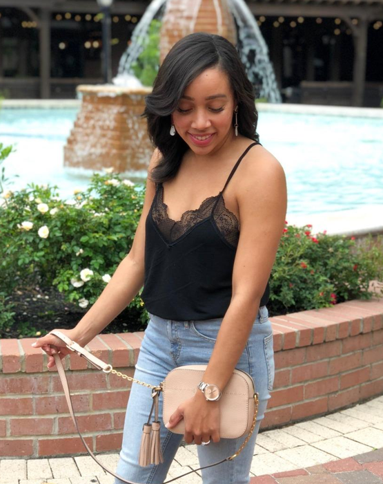 a reviewer wearing the black camisole