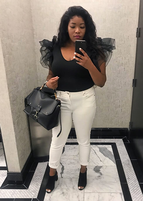 another reviewer styled in the black top paired with white jeans