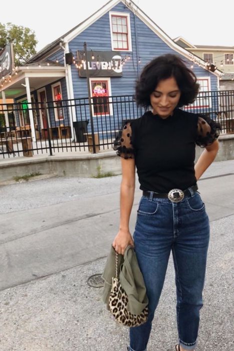 another reviewer showcasing the same top in an outdoor setting