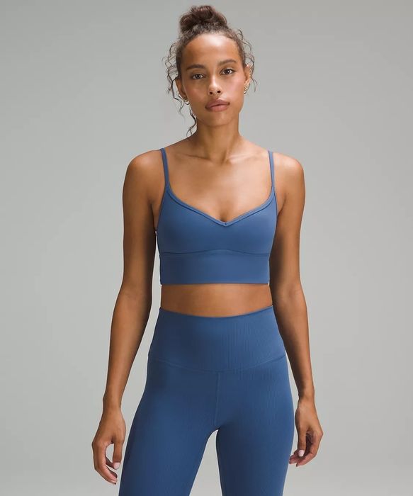 sweetheart sports bra with spaghetti straps worn by a model