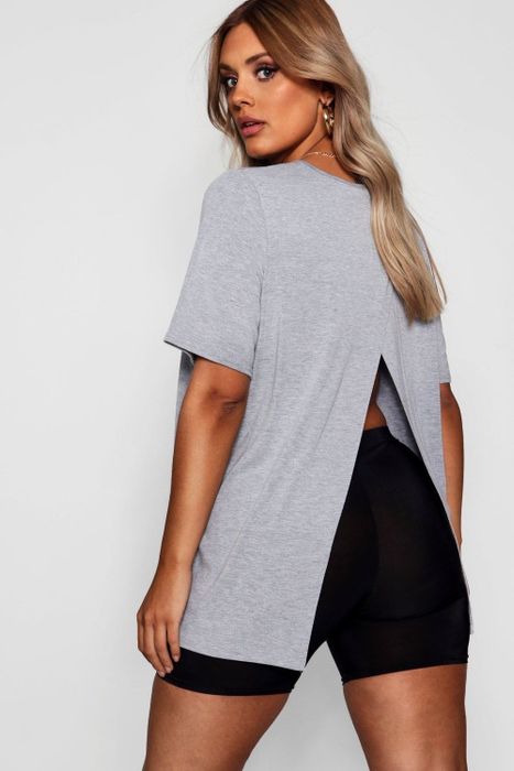 The model is wearing a simple gray crewneck top.