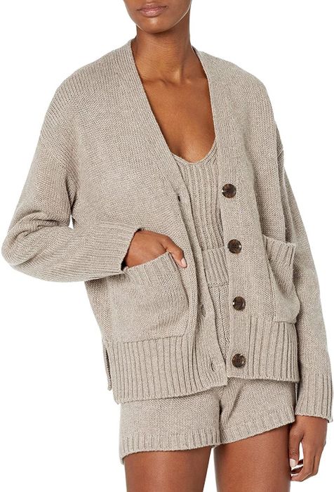 Model showcasing the taupe cardigan with the matching tank and shorts