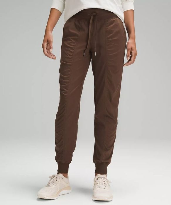 ruched joggers worn by a model in brown