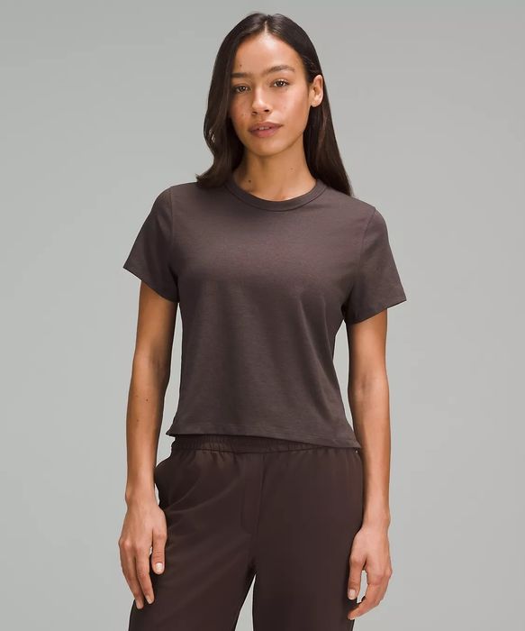 brown tee worn by a model